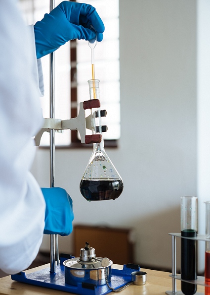 Doctor using a test tube.